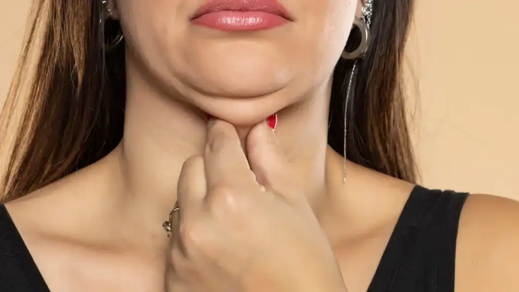 An image of a woman with double chin, sad, worried : Non Surgical Double Chin Removal Treatment in City of London, UK
